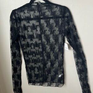 Free People Lady Lux Layering top.   Women’s size Large.  New with Tags